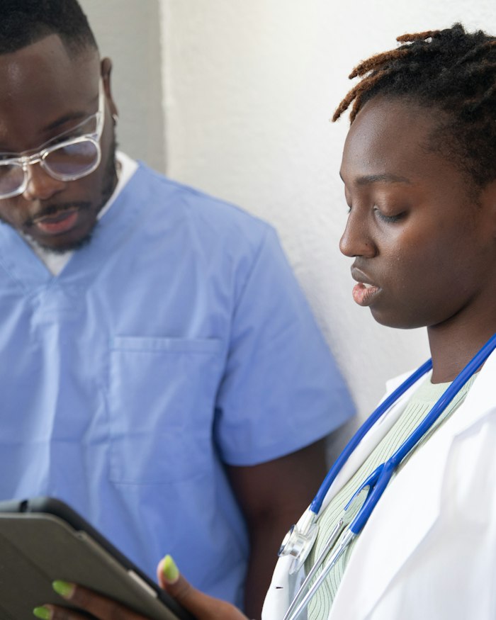 Clinician and patient reviewing care information together